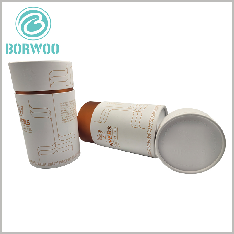 250g loose leaf tea packaging tube boxes with emboss, the inner tube can reveal part of the bronze gold to better reflect the luxury of the packaging