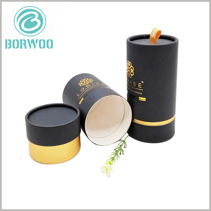 Black cardboard packaging tube for cosmetics boxes.The printing is quite simple, a ring of hot gold stamping is made on the surface