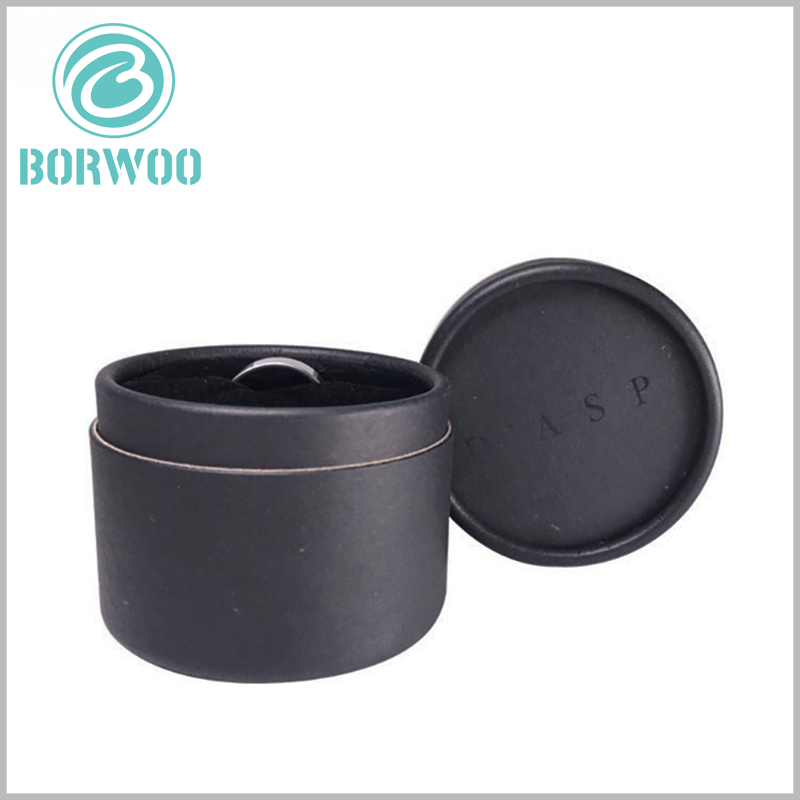 Black cardboard round tube jewelry boxes for rings.The black cardboard round boxes have EVA inserts inside to fix the ring, and play the role of beautiful packaging inside.