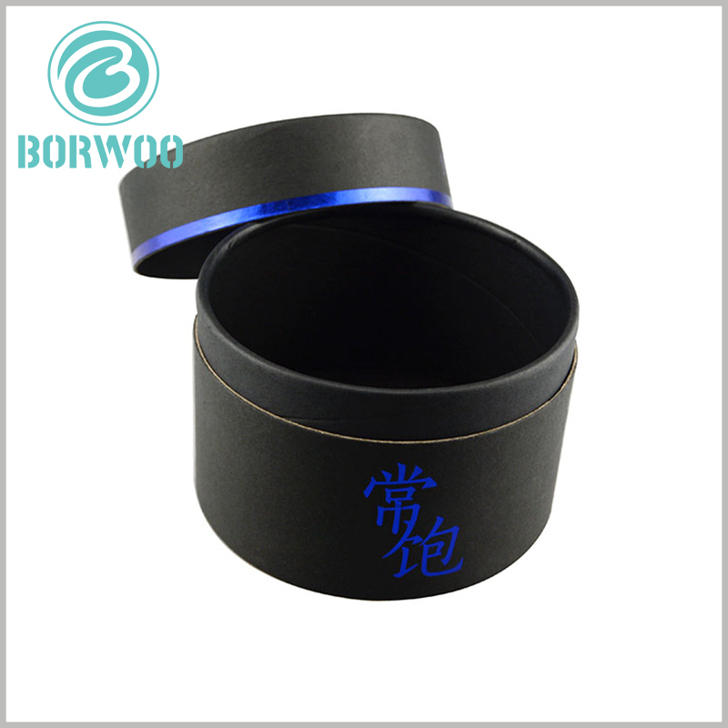 Black cardboard tube packaging boxes with lids. The matte black cardboard is used as the raw material of the paper tube packaging to improve the quality and touch of the packaging.