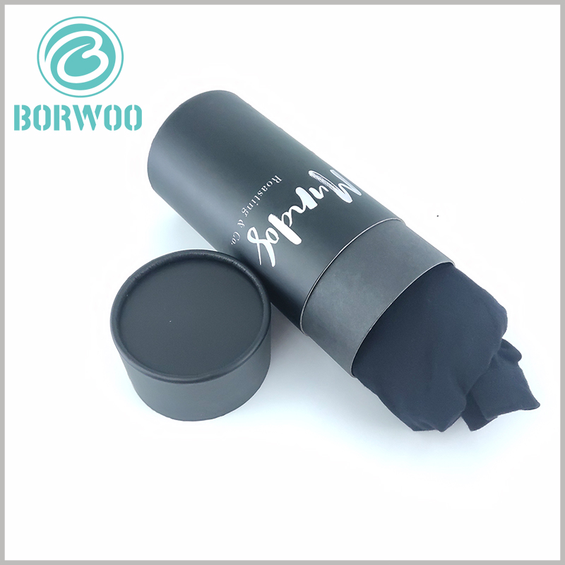 Black cardboard tube t shirt packaging boxes with logo.The shirt can be rolled up and placed in a black paper tube.