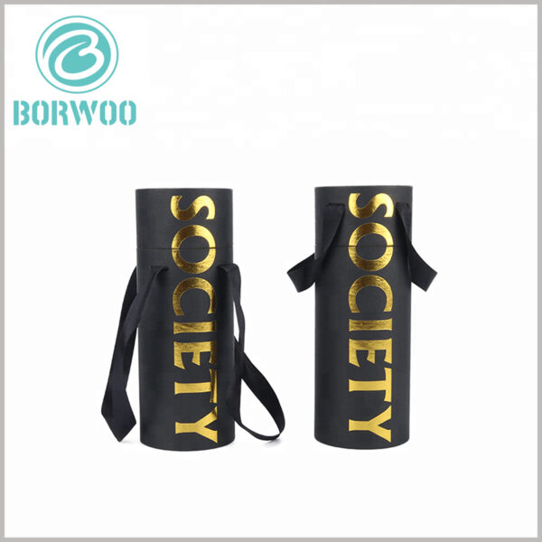 Black paper tube packaging with bronzing logo wholesale.Black hand strap makes carrying the package more convenient