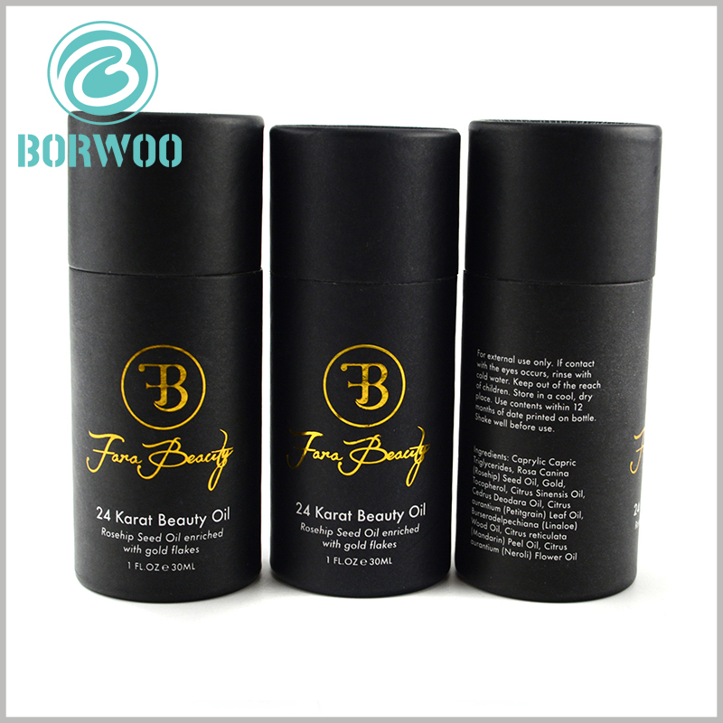 Black small diameter round cardboard boxes with lids for essential oil.Custom Black cardboard boxes with bronzing logo.