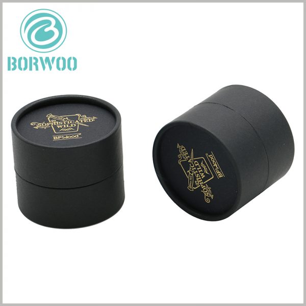Black small paper tube packaging boxes with bronzing logo.
