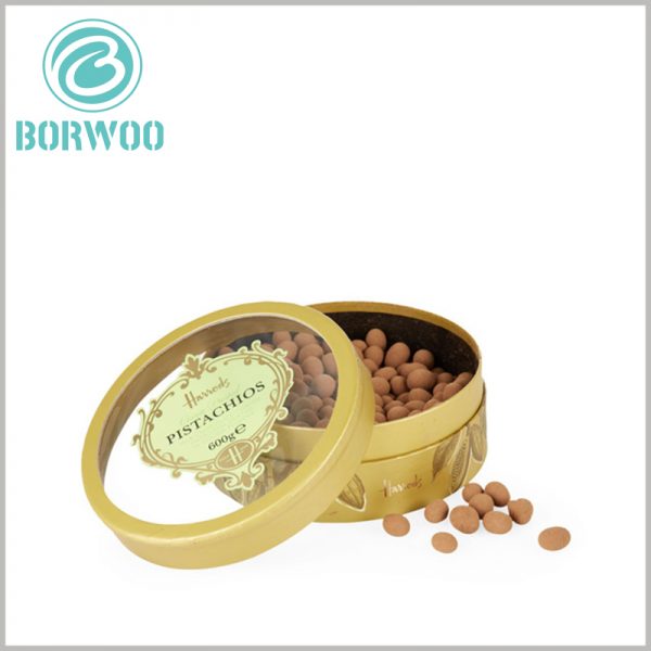 Cardboard tube gift packaging for chocolates boxes.The paper tube cover has a transparent PVC window for the product to be presented directly to the consumer