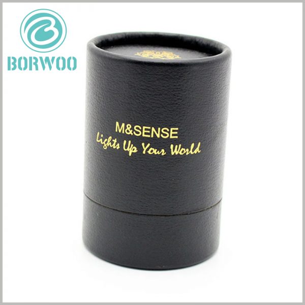Creative black cardboard round boxes with bronzing printing.The unique black leather paper is used as the laminate of the paper tube, making the packaging visually striking.