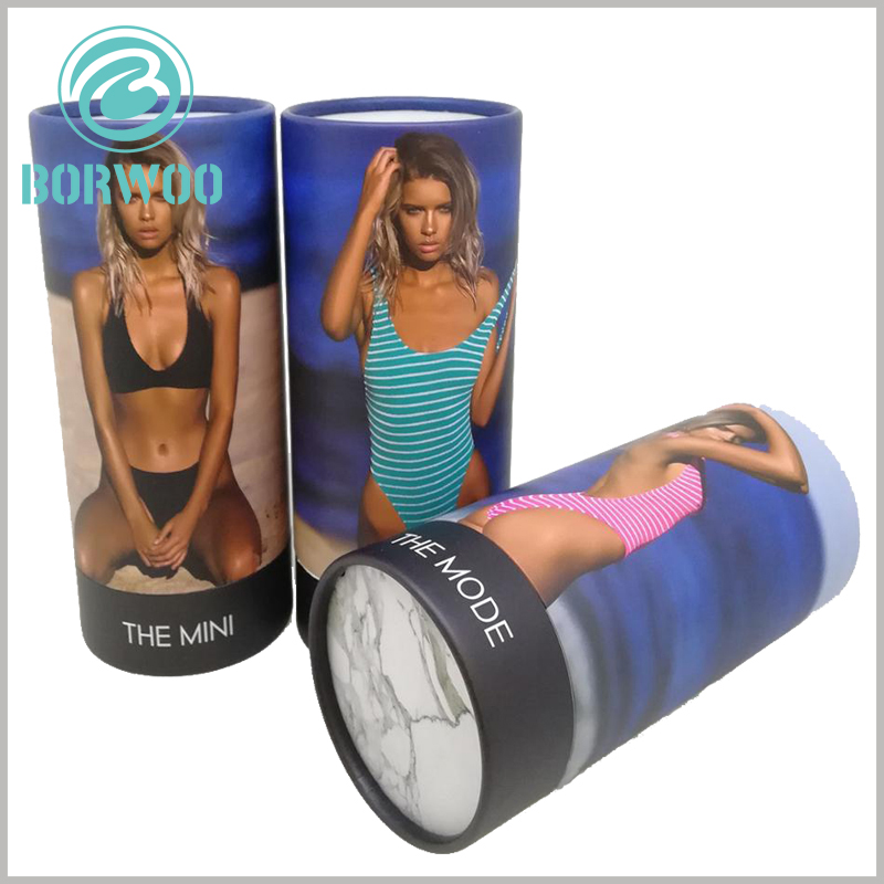 Creative cardboard tube boxes for underwear packaging.Let the model wearing a specific sexy underwear scene, design it as a picture printed on the round boxes.