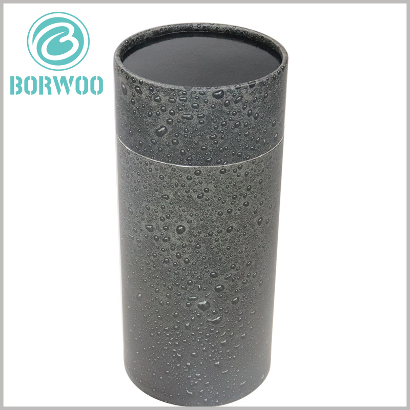Creative paper tube packaging for cosmetics.Water drops on a gray background are a common packaging design idea, but they are very attractive to consumers.