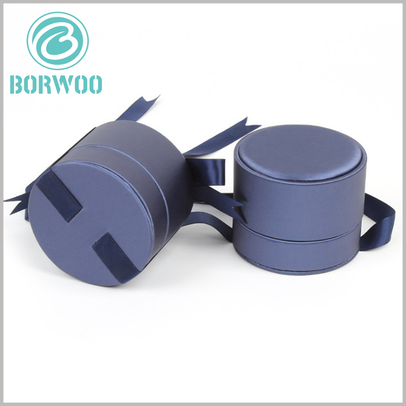 Custom Blue imitation leather tube packaging boxes wholesale.Fix the silk gift knot with special glue to prevent the gift knot from shaking and falling off.