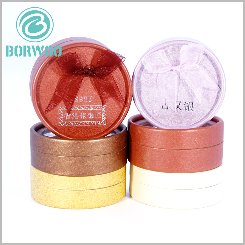 Custom Small cardboard tube gift boxes for jewelry packaging.Print the brand name and related information in the transparent window of the package