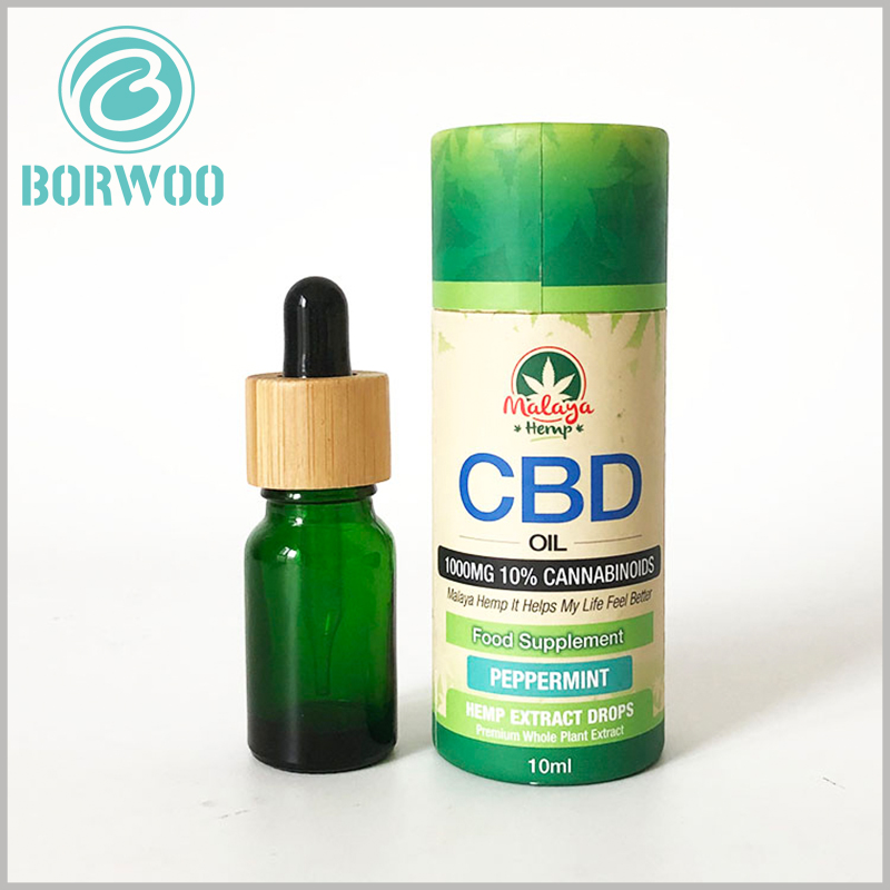 Custom Small cardboard tubes for 10ml CBD essential oil packaging.Maple leaves are printed on the surface of paper tubes as a universal essential oil mark
