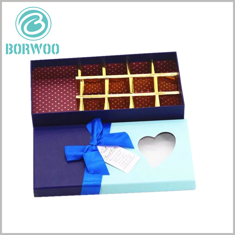 Custom cardboard chocolate boxes with heart-shaped window wholesale.The interior of the custom packaging has a partition formed of gold cardboard, which cuts the internal space into multiple individual small spaces.