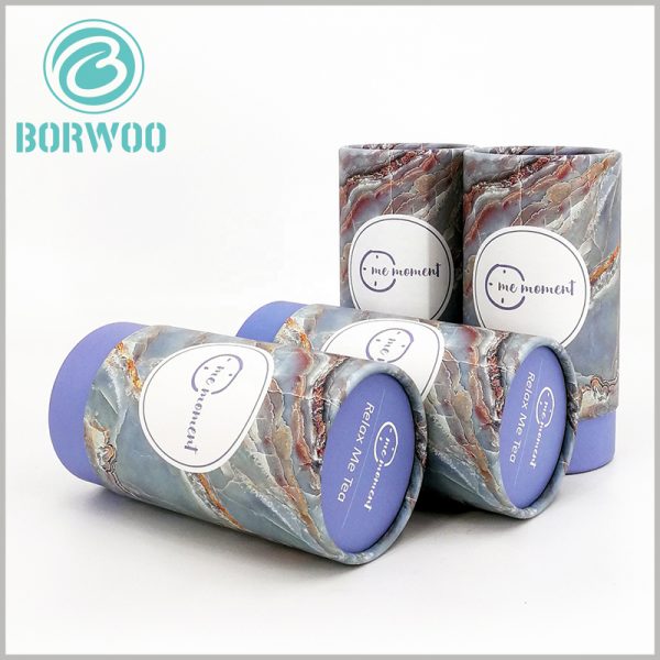 Custom cardboard tube food packaging boxes for tea boxes.The colorful motif is so well chosen along with cyan base and lid