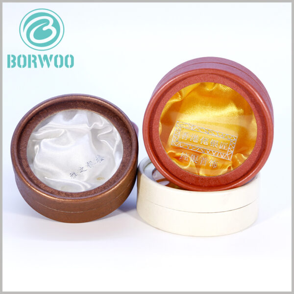 Exquisite cardboard tube jewelry gift packaging with windows.The inside of the box is decorated with silk scarves to increase the high-end packaging.