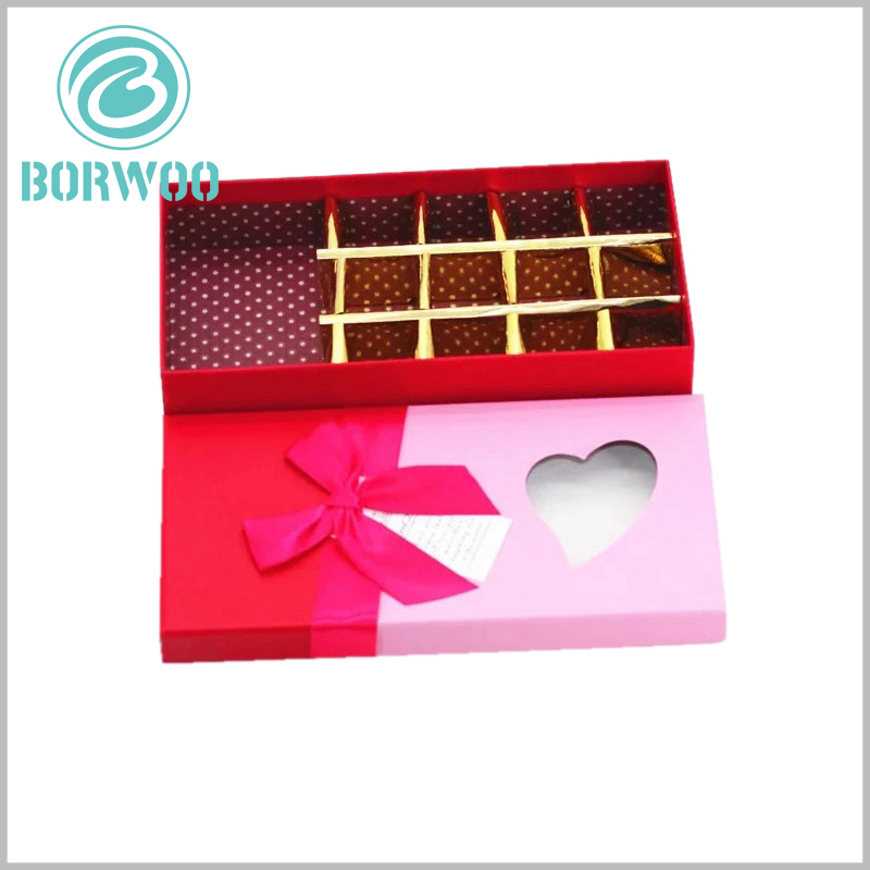 Hard cardboard chocolate boxes with heart-shaped window wholesale.Design the red gift bows on the front of the customized boxes, the product will be used as a gift and more valuable.