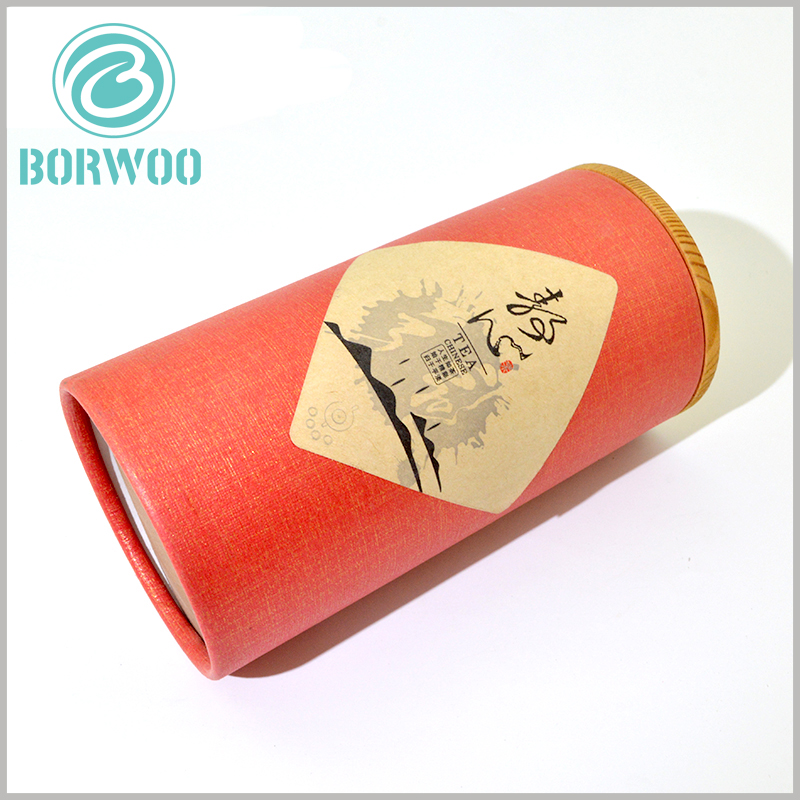 Large cardboard tube packaging with wooden lids for tea boxes