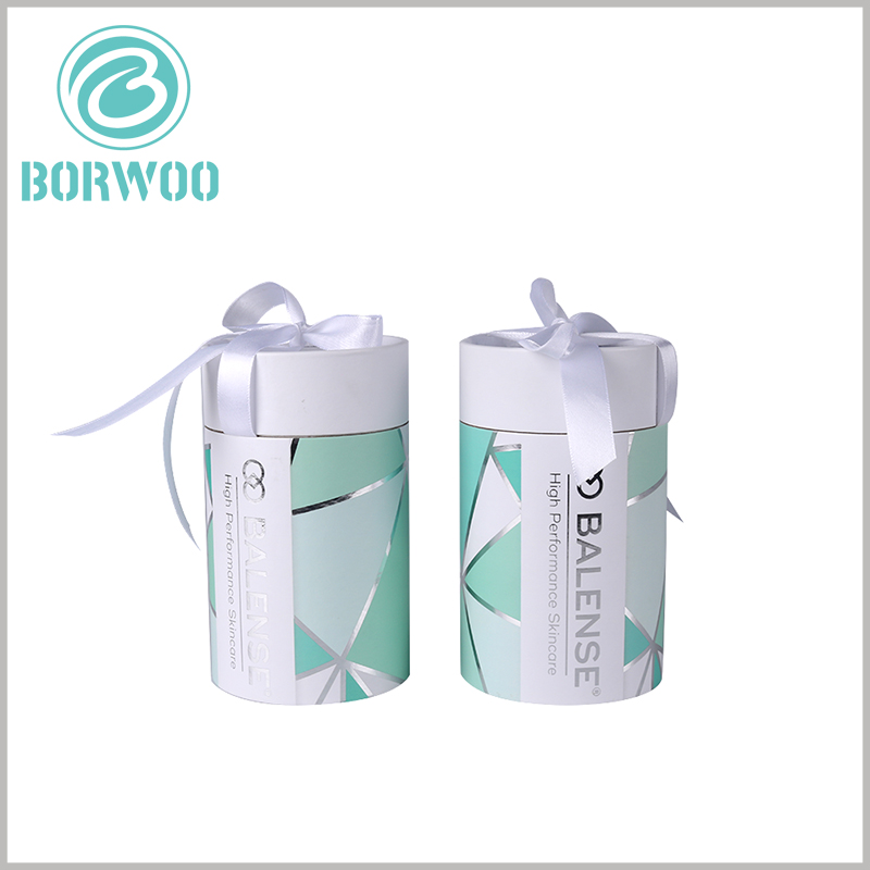 Paper tube gift packaging with bows for skin care boxes.The simplicity of design is realized by the clean style with LOGO