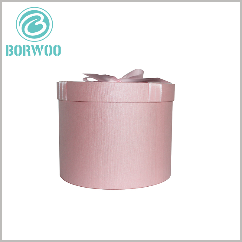 Pink cardboard round tubes gift packaging with window wholesale.We will provide different diameters and heights of paper tube packaging according to your specific product.