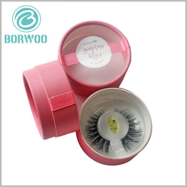 Pink cardboard tube boxes for eyelash packaging.adding a transparent window covered by 0.2mm PVC, and an adhesive label attached for further information.