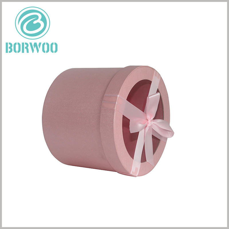 https://www.tube-boxes.com/wp-content/uploads/Pink-large-round-cardboard-tubes-gift-packaging-with-window.jpg