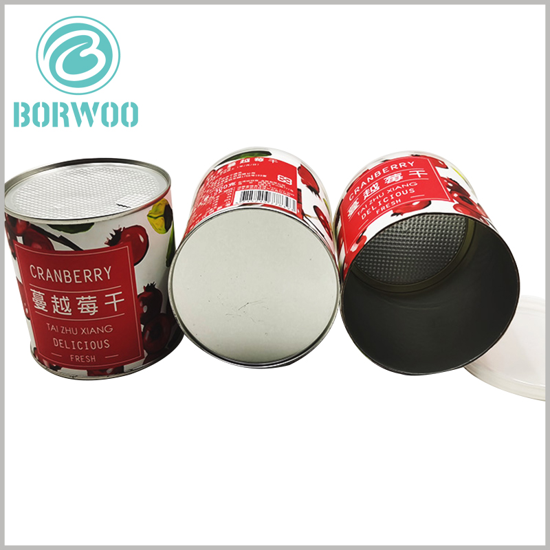 Strawberry dried fruit food tube packaging with foil cover.The bottom of the paper tube food packaging is a metal aluminum cover, and the top is an aluminum foil cover, which has a good airtightness for the cylindrical packaging