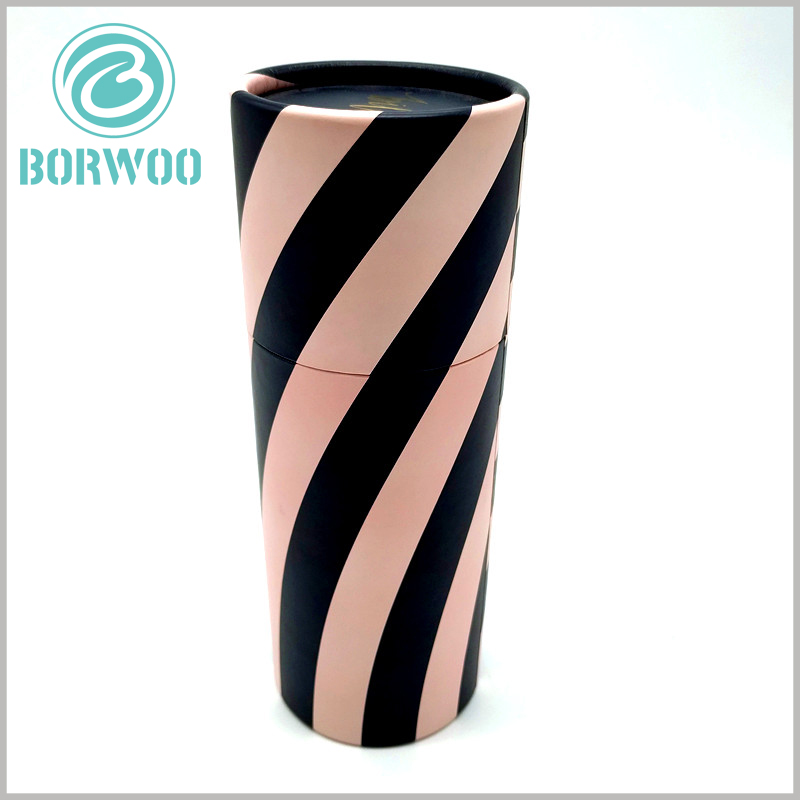 Thick wall cardboard tube packaging for clothes.The packaging design style is unique and attractive, which will promote the sale of clothes.