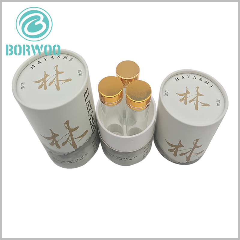 Three bottles tube packaging boxes with EVA insert, strong paper tubes can well protect fragile glass bottles.