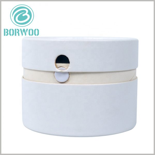 White cardboard round tube packaging boxes.The lid is fixed with a simple round EVA buckle on the side of the inner tube,which will be sealed by the whole on the lid rear.