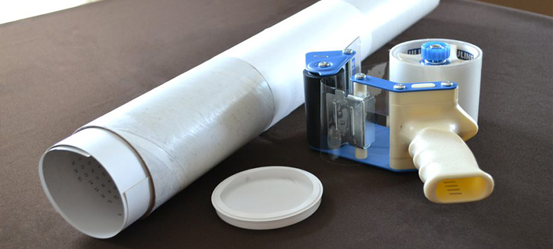 White paper tube packaging for loading documents