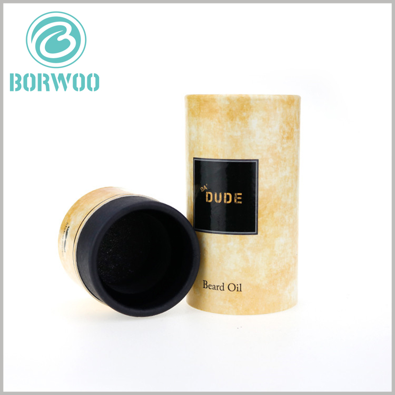 cmyk printing paper tube packaging for essential oil products.the inner tube is filled with black sponge to protect the fragile glass oil bottle inside.