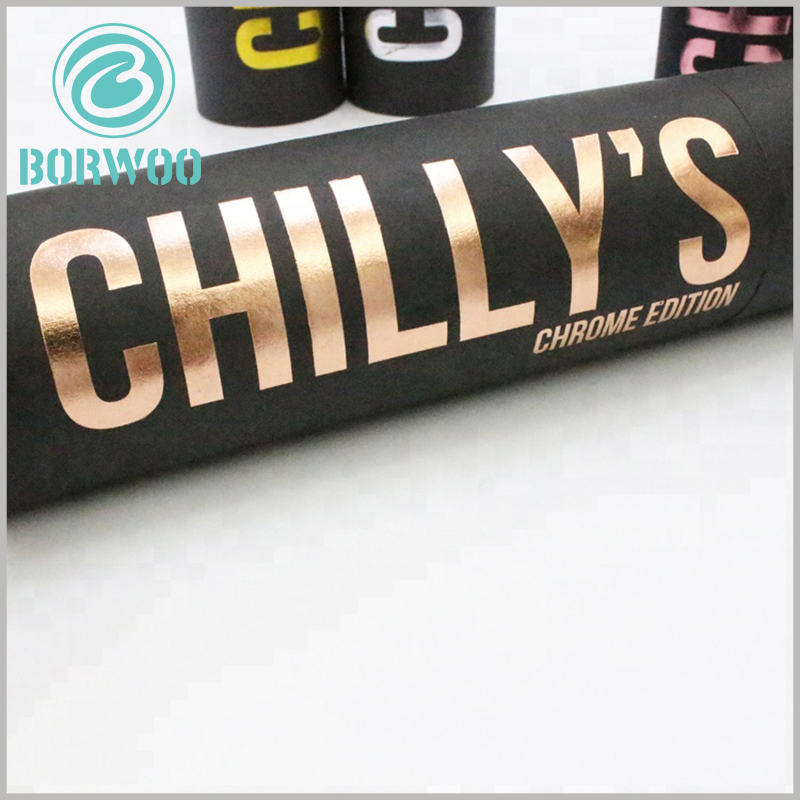 custom black large cardboard tube packaging with bronzing logo. The large-diameter paper tube packaging can contain many types of products, such as red wine bottles and sports bottles.