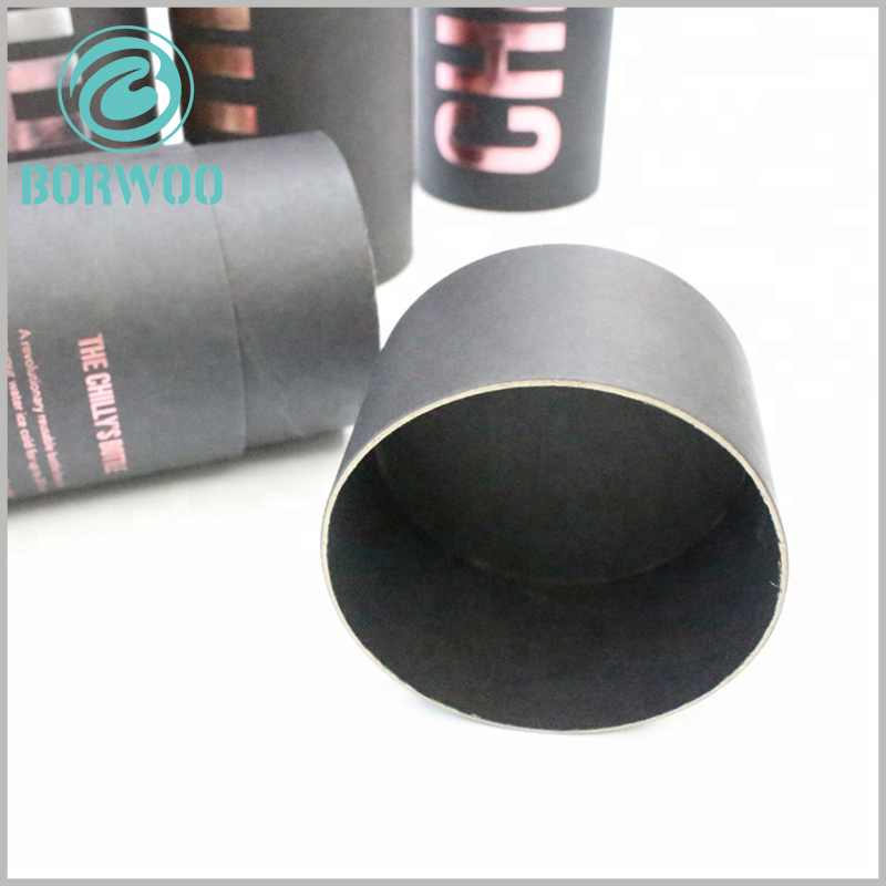 custom black large cardboard tube packaging with lids. The customized paper tube packaging uses matte black cardboard as the raw material, which can improve the aesthetics of the packaging and increase the attractiveness.