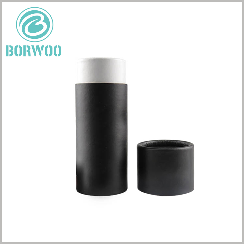 custom black small round boxes with lid.Simple printing of brand and product information on black packaging background