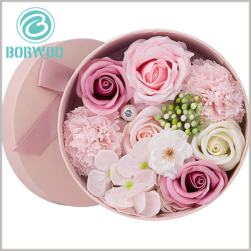custom cardboard round boxes for flowers. The customized packaging of large cardboard round boxes is rigid, which can fully protect the stability and value of the flowers.