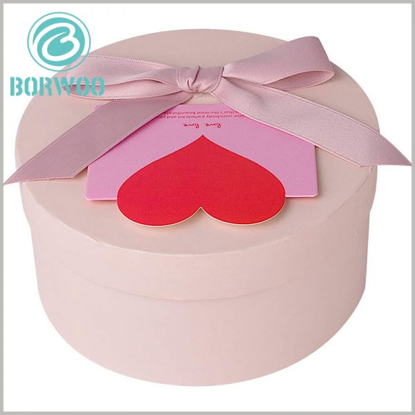 custom cardboard round gift boxes with bows. The high degree of customization of the paper tube packaging ensures that the flowers and packaging are perfectly matched.