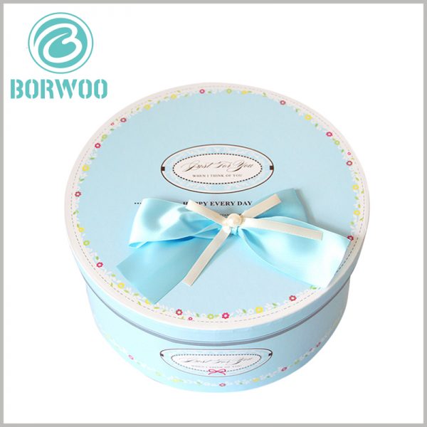 custom large cardboard round boxes with lids, with bows.Four-color printing increases the richness of the package's display content