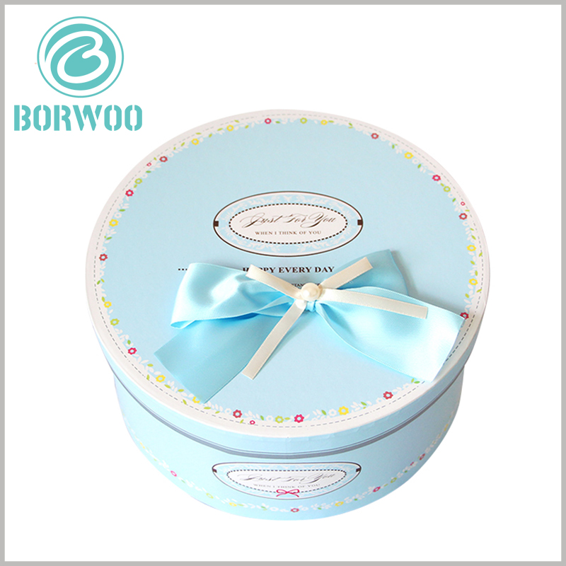 custom large cardboard round boxes with lids, with bows.Four-color printing increases the richness of the package's display content