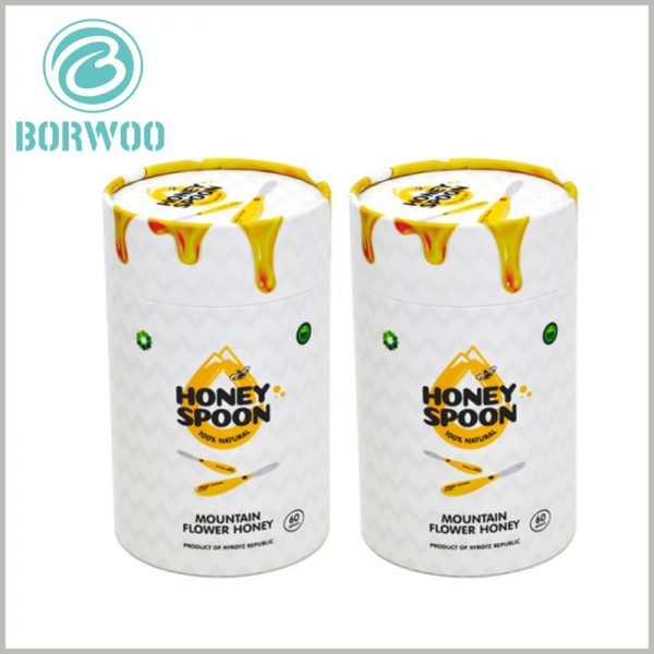 custom paper tube packaging for honey spoon. The design of the lid part of the paper tube uses honey liquid as the main element, which is very attractive.