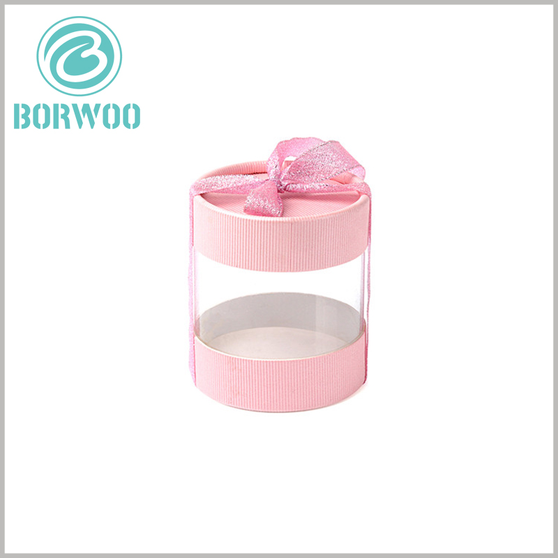 custom plastic tube gift packaging boxes with paper lids.The gift is decorated with a gift knot to make the gift more popular