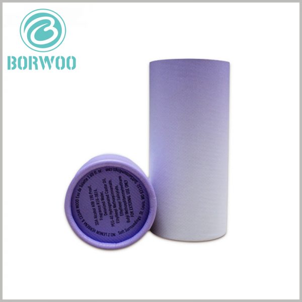 cylindrical cardboard tubes packaging for cosmetic boxes.elegant violet with fading effect, shows how precious the product inside is