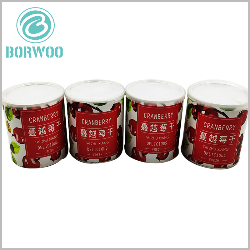 dried fruit food tube packaging with foil cover and plastic lids.The customized tube packaging is used for food, and the relevant patterns and information of the dried strawberry fruit are printed on the body part of the paper tube, which plays a role of publicity