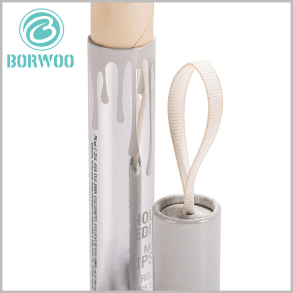 lip gloss tube boxes packaging wholesale. There is a silk scarf pull ring on the top of the lip gloss packaging tube, which makes the whole package more beautiful.