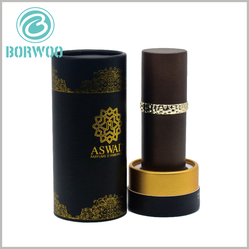 small cardboard tubes packaging for perfume boxes.the main colors are only gold and black, giving an impression of high-end products inside.