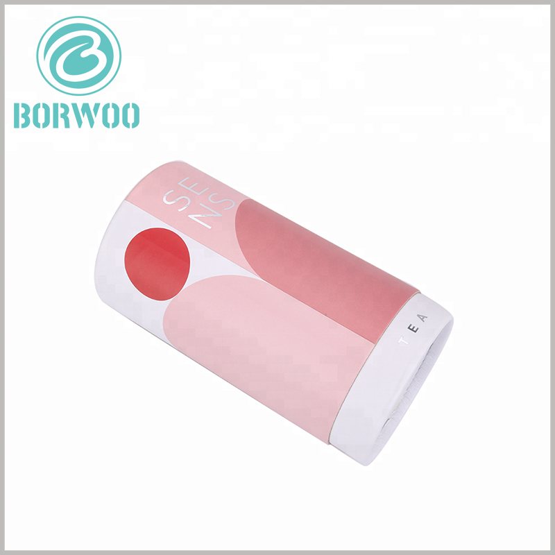 wholesale fashion cardboard cylinder tubes packaging for tea boxes.The brand's LOGO is printed on the surface of the package using a hot silver process.