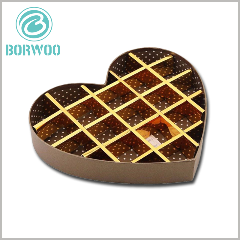 wholesale heart shaped cardboard chocolate gift boxes packaging.The gold cardboard partition divides the inside of the package into a lot of small cells, which are used for chocolates.